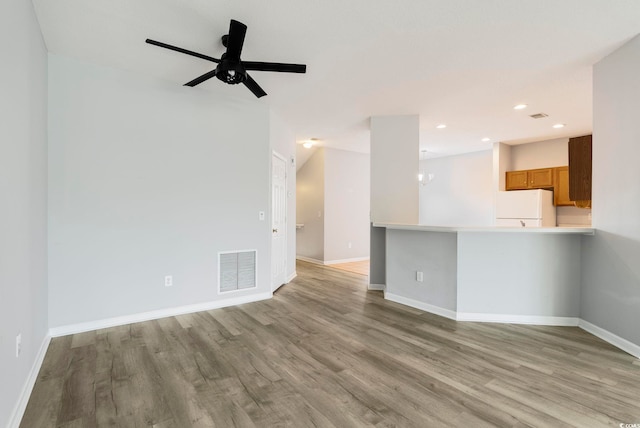 4430-G Montrose Ln Unit G, Myrtle Beach, SC 29579 - unfurnished living room featuring light wood finished floors, ceiling fan, baseboards, and recessed lighting