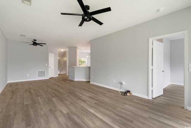 4430-G Montrose Ln Unit G, Myrtle Beach, SC 29579 - unfurnished living room with a ceiling fan, light wood-style flooring, and baseboards