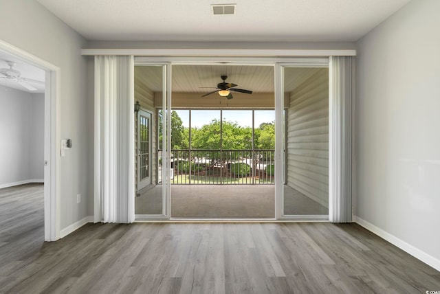 4430-G Montrose Ln Unit G, Myrtle Beach, SC 29579 - spare room featuring a ceiling fan, wood finished floors, and baseboards
