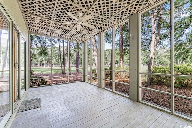 159-1 Weehawka Way Unit 159-1, Pawleys Island, SC 29585 - unfurnished sunroom featuring ceiling fan, view of scattered trees, and plenty of natural light