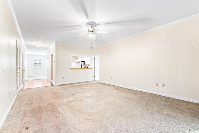 159-1 Weehawka Way Unit 159-1, Pawleys Island, SC 29585 - unfurnished living room with carpet floors, ornamental molding, ceiling fan, and baseboards
