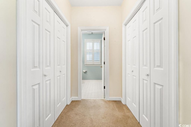 159-1 Weehawka Way Unit 159-1, Pawleys Island, SC 29585 - hall featuring light colored carpet and baseboards