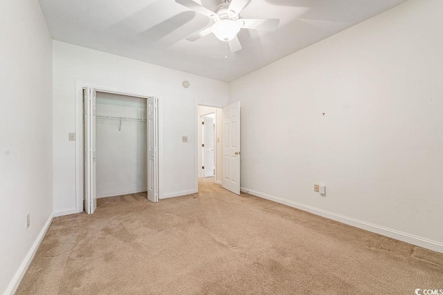 159-1 Weehawka Way Unit 159-1, Pawleys Island, SC 29585 - unfurnished bedroom with light colored carpet, a closet, baseboards, and ceiling fan
