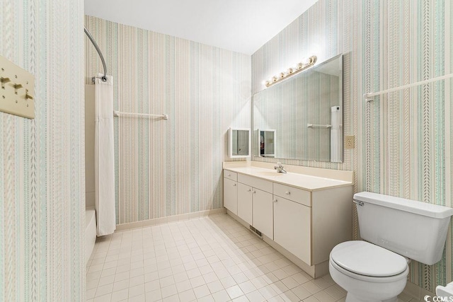 159-1 Weehawka Way Unit 159-1, Pawleys Island, SC 29585 - bathroom with tile patterned flooring, vanity, toilet, and shower / tub combo with curtain