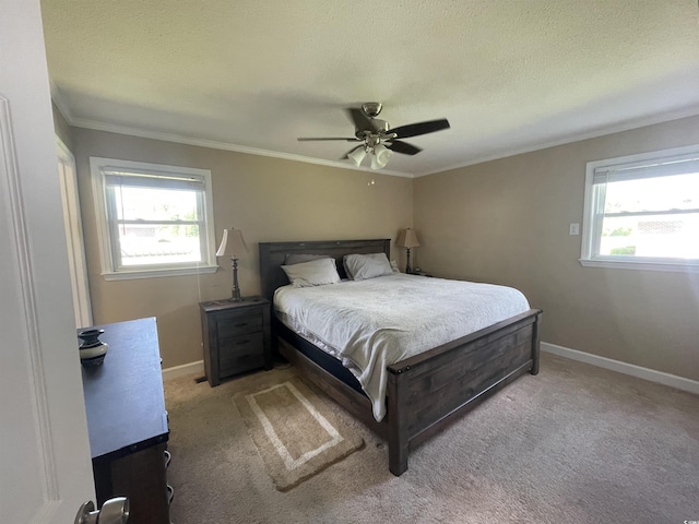 4637 Dogwood St, Loris, SC 29569 - bedroom featuring crown molding, carpet floors, baseboards, ceiling fan, and a textured ceiling