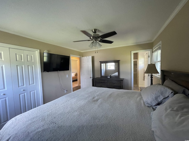 4637 Dogwood St, Loris, SC 29569 - bedroom with ornamental molding, a textured ceiling, a closet, ceiling fan, and ensuite bathroom