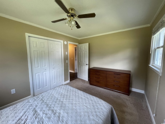 4637 Dogwood St, Loris, SC 29569 - carpeted bedroom featuring crown molding, baseboards, a ceiling fan, and a closet