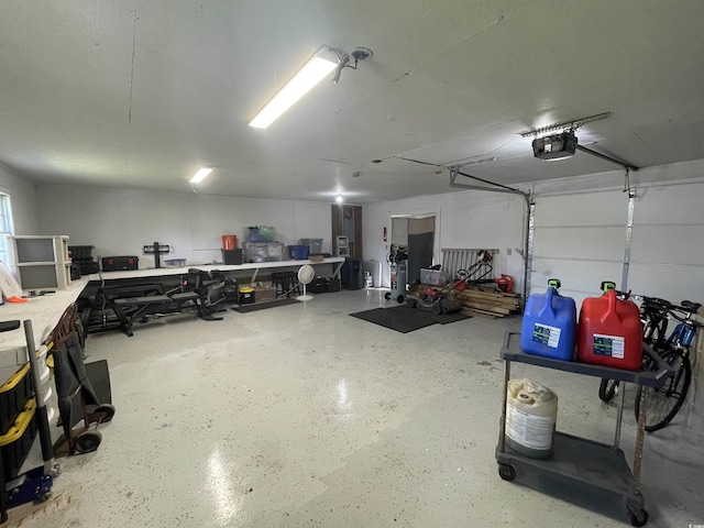 4637 Dogwood St, Loris, SC 29569 - garage with a workshop area and a garage door opener