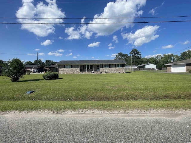4637 Dogwood St, Loris, SC 29569 - ranch-style home with a garage and a front yard