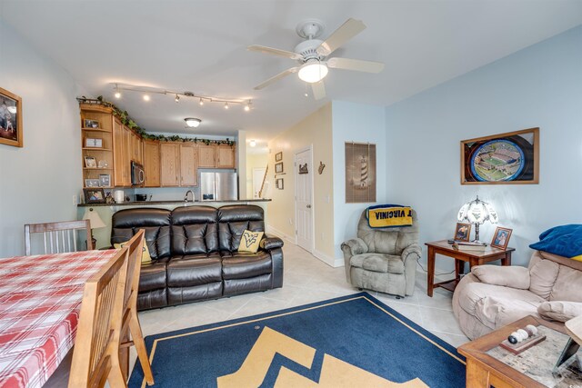 702 Beach Walk Pl Unit 702, Myrtle Beach, SC 29577 - living room with light tile patterned flooring and ceiling fan