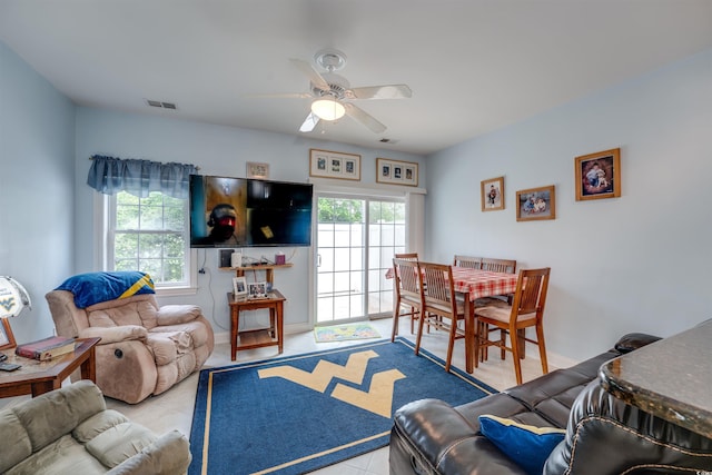 702 Beach Walk Pl Unit 702, Myrtle Beach, SC 29577 - tiled living room featuring ceiling fan