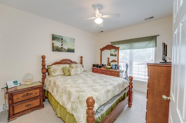 702 Beach Walk Pl Unit 702, Myrtle Beach, SC 29577 - bedroom with light carpet, baseboards, and ceiling fan