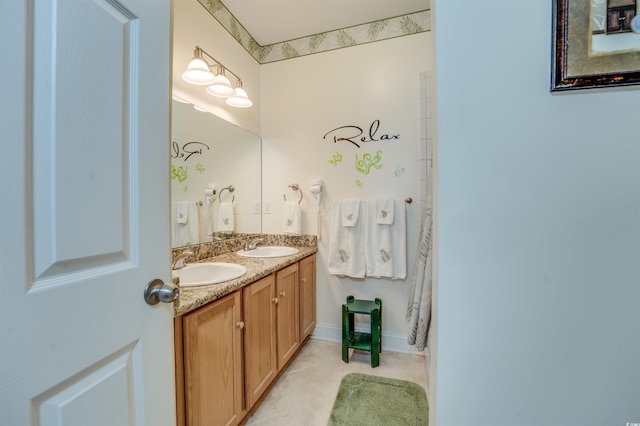702 Beach Walk Pl Unit 702, Myrtle Beach, SC 29577 - bathroom featuring double vanity and tile patterned flooring