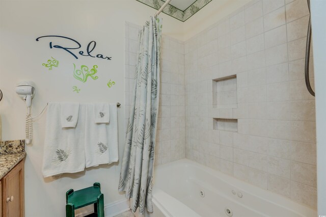 702 Beach Walk Pl Unit 702, Myrtle Beach, SC 29577 - bathroom with a combined bath / shower with jetted tub and vanity