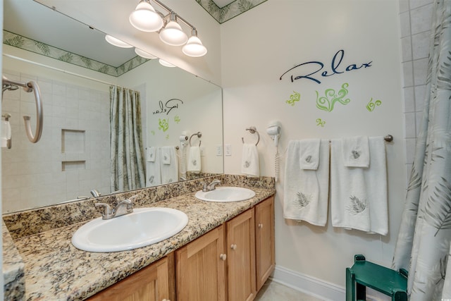 702 Beach Walk Pl Unit 702, Myrtle Beach, SC 29577 - bathroom with double vanity and curtained shower