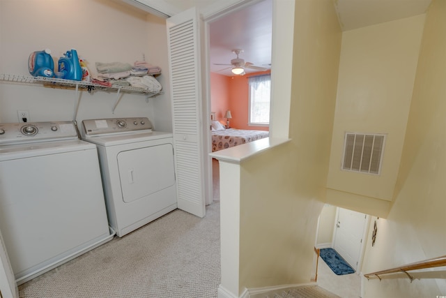702 Beach Walk Pl Unit 702, Myrtle Beach, SC 29577 - washroom with washer and dryer, a ceiling fan, light colored carpet, and baseboards