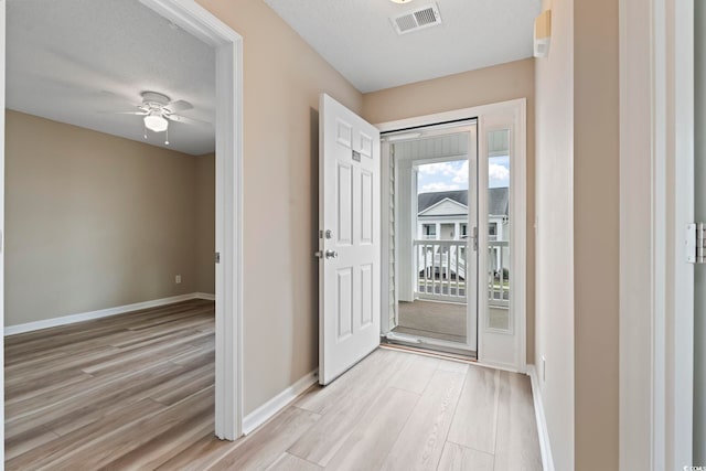 4924 Pond Shoals Ct Unit 201, Myrtle Beach, SC 29579 - foyer with light wood finished floors, a ceiling fan, and baseboards