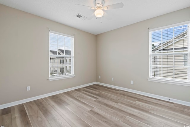 4924 Pond Shoals Ct Unit 201, Myrtle Beach, SC 29579 - unfurnished room with ceiling fan, light wood-style floors, and baseboards