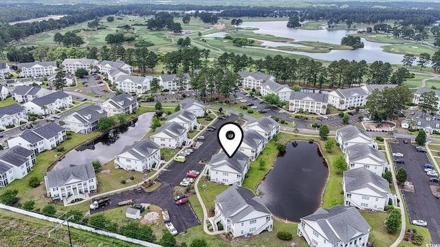 4924 Pond Shoals Ct Unit 201, Myrtle Beach, SC 29579 - aerial view of property and surrounding area with a nearby body of water, a local golf course, and nearby suburban area
