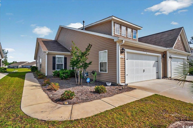 1631 Hepburn Dr, Little River, SC 29566 - view of home's exterior featuring driveway, a lawn, and an attached garage