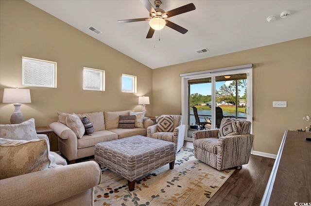 1631 Hepburn Dr, Little River, SC 29566 - living room featuring ceiling fan, wood finished floors, lofted ceiling, healthy amount of natural light, and baseboards