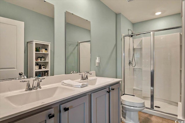 1631 Hepburn Dr, Little River, SC 29566 - bathroom with toilet, a shower stall, double vanity, and tile patterned floors