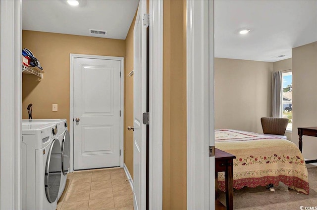 1631 Hepburn Dr, Little River, SC 29566 - washroom with washing machine and dryer and light tile patterned floors