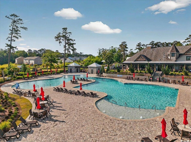 1631 Hepburn Dr, Little River, SC 29566 - community pool featuring a patio