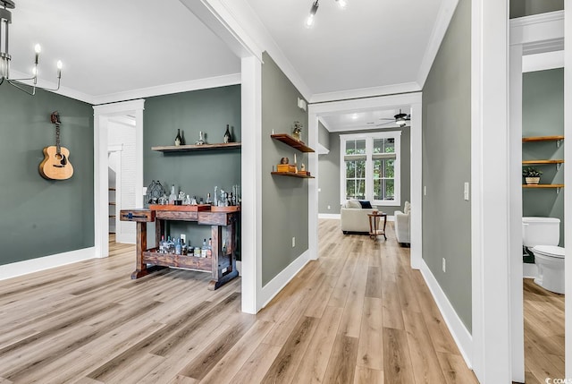 103 Pigeon Forge Ct, Murrells Inlet, SC 29576 - hall with ornamental molding, light wood-style flooring, and a chandelier