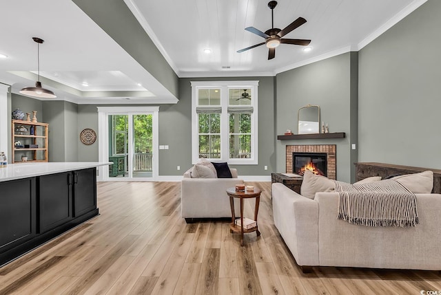 103 Pigeon Forge Ct, Murrells Inlet, SC 29576 - living room featuring ornamental molding, a ceiling fan, light wood-type flooring, a brick fireplace, and recessed lighting