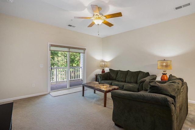 6253 Catalina Dr Unit 1523, North Myrtle Beach, SC 29582 - living room with light colored carpet, ceiling fan, and baseboards