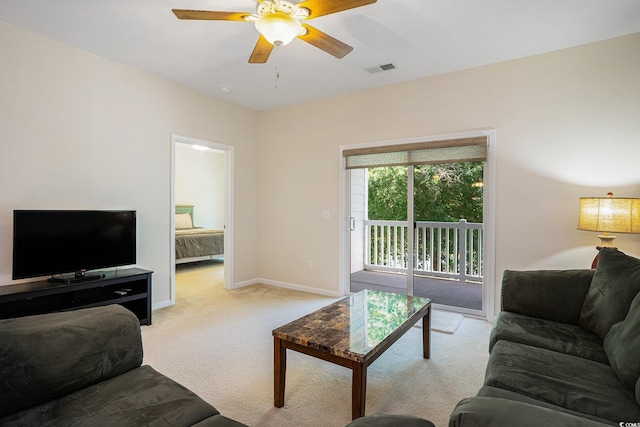 6253 Catalina Dr Unit 1523, North Myrtle Beach, SC 29582 - living area with light carpet, a ceiling fan, and baseboards