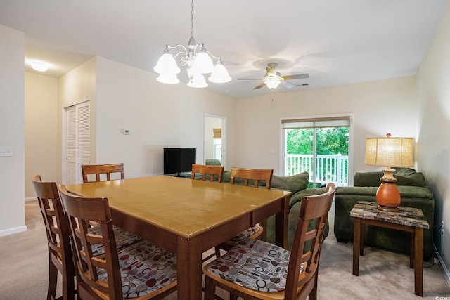 6253 Catalina Dr Unit 1523, North Myrtle Beach, SC 29582 - dining area with light colored carpet, a chandelier, a ceiling fan, and baseboards
