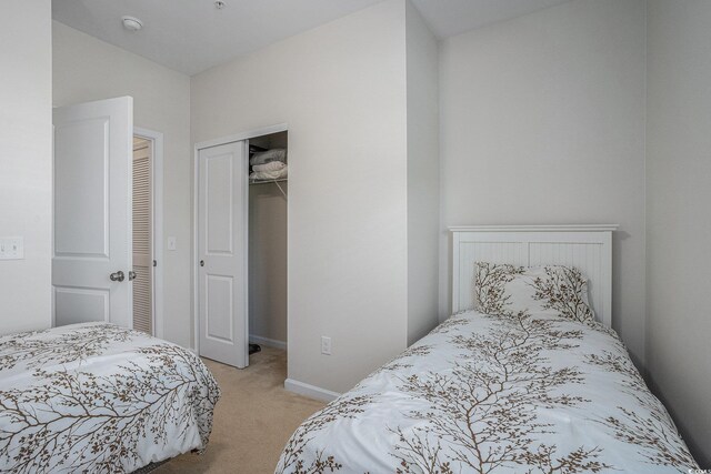 6253 Catalina Dr Unit 1523, North Myrtle Beach, SC 29582 - bedroom featuring light carpet, a closet, and baseboards