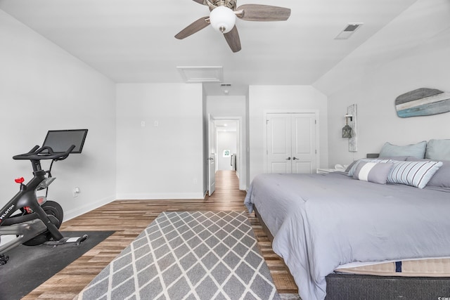1008 Mary Read Dr, North Myrtle Beach, SC 29582 - bedroom with attic access, wood finished floors, baseboards, a closet, and a ceiling fan