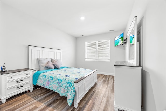 1008 Mary Read Dr, North Myrtle Beach, SC 29582 - bedroom featuring wood finished floors and baseboards