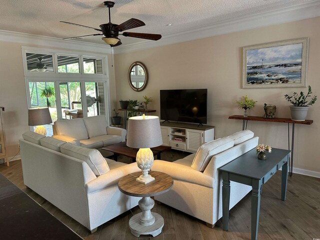 5718 Herring Gull Cir N, Myrtle Beach, SC 29582 - living room featuring ornamental molding, ceiling fan, wood finished floors, baseboards, and a textured ceiling