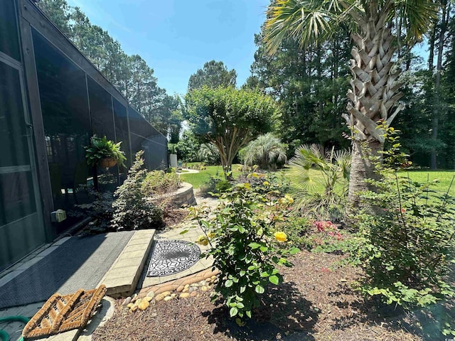 5718 Herring Gull Cir N, Myrtle Beach, SC 29582 - view of yard with a lanai and view of wooded area