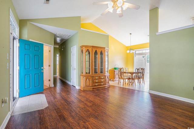 264 La Patos Dr, Myrtle Beach, SC 29588 - foyer entrance with a ceiling fan, wood finished floors, baseboards, high vaulted ceiling, and a chandelier