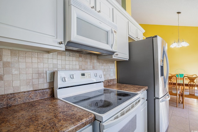 264 La Patos Dr, Myrtle Beach, SC 29588 - kitchen with white appliances, a chandelier, white cabinets, dark countertops, and tasteful backsplash