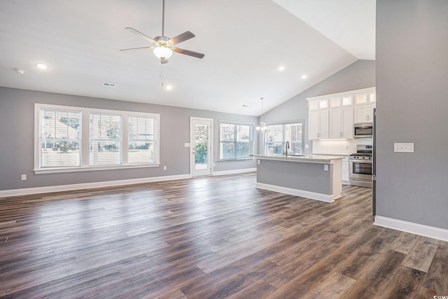 2004 Potomac Ct, Myrtle Beach, SC 29579 - unfurnished living room featuring ceiling fan, baseboards, dark wood-style floors, recessed lighting, and high vaulted ceiling