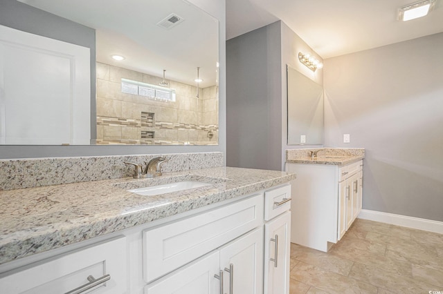 2004 Potomac Ct, Myrtle Beach, SC 29579 - full bath with two vanities, a tile shower, and baseboards