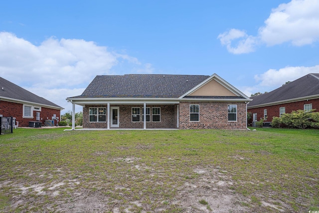 2004 Potomac Ct, Myrtle Beach, SC 29579 - back of property featuring brick siding and a lawn