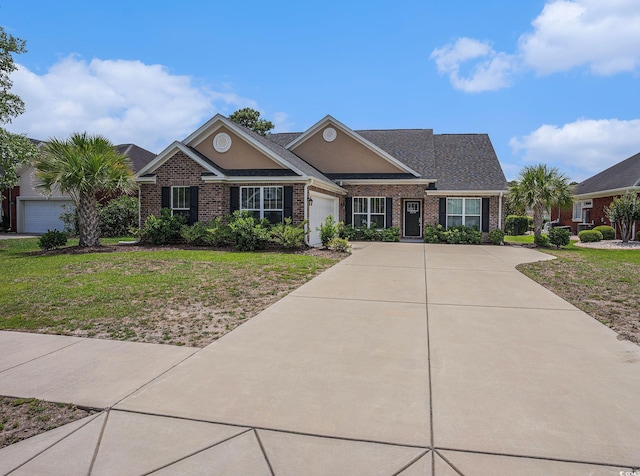 2004 Potomac Ct, Myrtle Beach, SC 29579 - view of front of property featuring brick siding, an attached garage, a front lawn, and concrete driveway