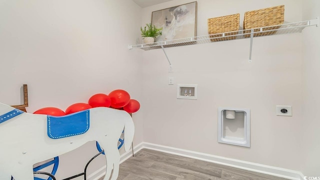 140 Dagger Ct, Myrtle Beach, SC 29588 - laundry area with washer hookup, wood finished floors, electric dryer hookup, and baseboards