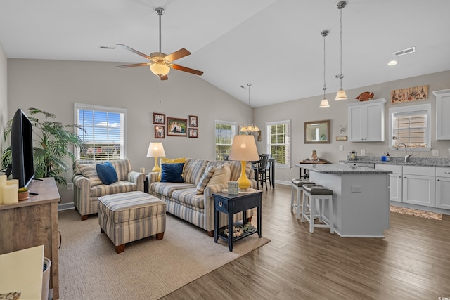 4319 Grande Harbour Blvd, Little River, SC 29566 - living area with a ceiling fan, wood finished floors, recessed lighting, baseboards, and high vaulted ceiling