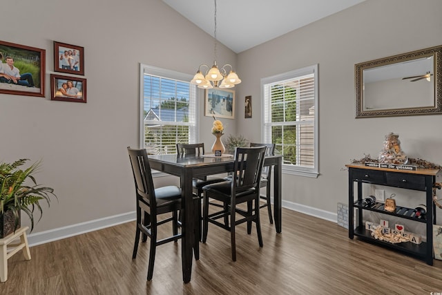 4319 Grande Harbour Blvd, Little River, SC 29566 - dining area featuring a chandelier, wood finished floors, baseboards, and high vaulted ceiling