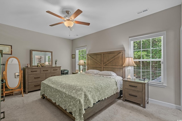 4319 Grande Harbour Blvd, Little River, SC 29566 - bedroom with light carpet, baseboards, and ceiling fan