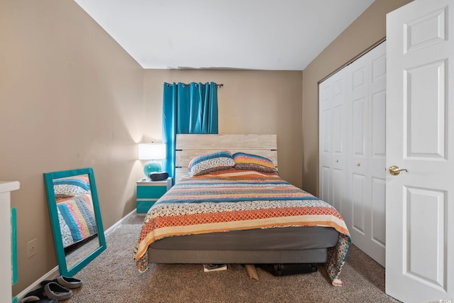 1100 Possum Trot Rd Unit C-203, North Myrtle Beach, SC 29582 - carpeted bedroom with a closet and baseboards