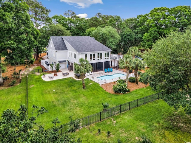 113 Trotter Trl, Georgetown, SC 29440 - rear view of property featuring an outdoor fire pit, a patio, an attached garage, a shingled roof, and stairway